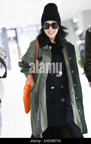 Taiwanese singer-songwriter, actress, director and writer Liu Jo-ying or Rene Liu shows up at Shanghai airport before departure in Shanghai, China, 29 Stock Photo