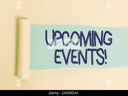 Handwriting text Upcoming Events. Conceptual photo thing that will happens or takes place soon planned occasion Cardboard which is torn in the middle Stock Photo