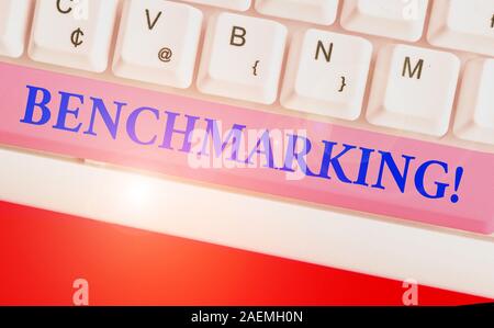 Conceptual hand writing showing Benchmarking. Concept meaning evaluate something by comparison with standard or scores Stock Photo