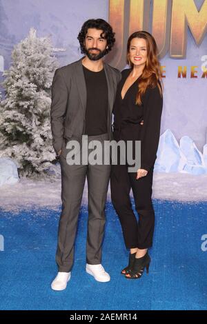 Justin Baldoni and Emily Baldoni at the world premiere of "Jumanji: The
