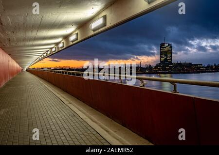 Riga, Latvia - Bicycle and pedestrian lane under the Salu Bridge Stock Photo