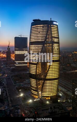 An outside view of Leeza SOHO, which is a skyscraper designed by late Late Zahanicked and nicknamed as 'the eye of night' or 'the eye of city,' due to Stock Photo