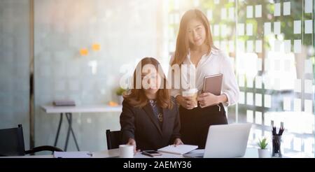 Cropped shot of young beautiful businesswoman working and looking at the camera Stock Photo