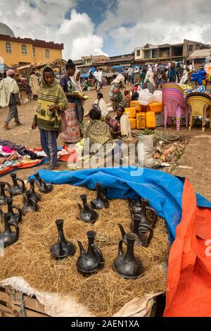 Ethiopia, Amhara Region, Debark, town centre, market area, ceramic traditional coffee pots in straw Stock Photo