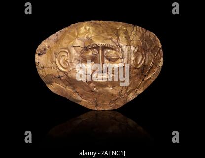 Mycenaean gold death mask, Grave Cicle A, Mycenae, Greece. National Archaeological Museum of Athens.  Black Background  This death mask is typical of Stock Photo