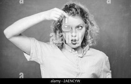 chemistry classroom. scientist at school lab. school lesson. chemistry research results. surprised student with beaker. biology experiment. sample formula. girl hold chemical flask with liquid. Stock Photo