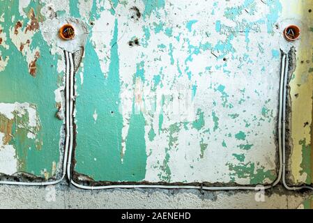 New electrical installation, socket and electrical wires on the wall, renovation concept Stock Photo