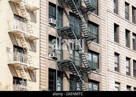 Fire escape stairs on outside of NYC building Stock Photo