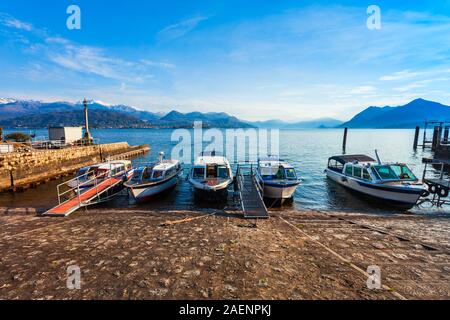 Pier with boats in the Stresa town, located at the shore of the Lago Maggiore Lake in north Italy. Stock Photo