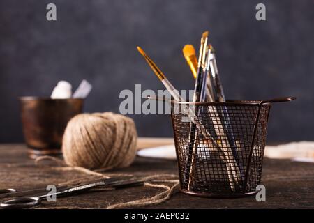 Composition with different objects on the table. Making wooden christmas toys. Stock Photo