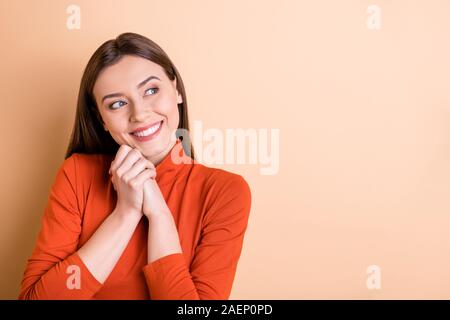 Close-up portrait of her she nice attractive dreamy delighted cheerful cheery straight-haired girl expecting enjoying good news isolated over beige Stock Photo