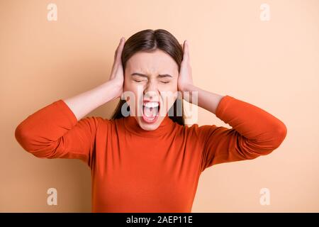 Close-up portrait of her she nice attractive crazy outraged gloomy frustrated desperate straight-haired girl expressing despair grief isolated over Stock Photo