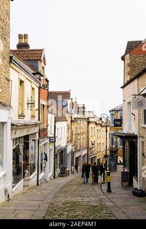 Looking down a narrow cobbled street with independent small shops. Catherine Hill, Frome, Somerset, England, UK, Britain Stock Photo