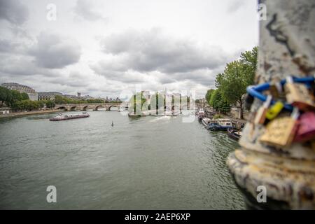 Boats and Locks on Bridge at Seine Stock Photo