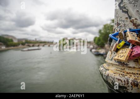 Boats and Locks on Bridge at Seine Stock Photo