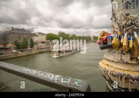 Boats and Locks on Bridge at Seine Stock Photo