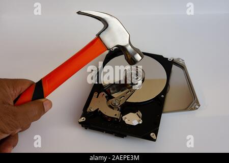 Smash the Platters to Destroy Information from Hard Disk Drive - Conceptual Photo Stock Photo