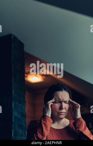 Woman with severe migraine headache, selective focus Stock Photo