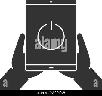 Hands holding tablet computer glyph icon. Device turning off. Silhouette symbol. Tablet pc with power button. Negative space. Vector isolated illustra Stock Vector
