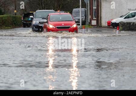Aberfoyle, Stirlingshire, Scotland, UK. 10th Dec, 2019. UK weather - flooding and road closures in Aberfoyle after the River Forth bursts its banks Credit: Kay Roxby/Alamy Live News Stock Photo