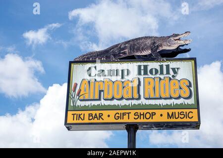 Melbourne Florida,St. Saint Johns River,Camp Holly Airboat Rides,tiki bar,roadside attraction,sign,alligator,FL190920072 Stock Photo