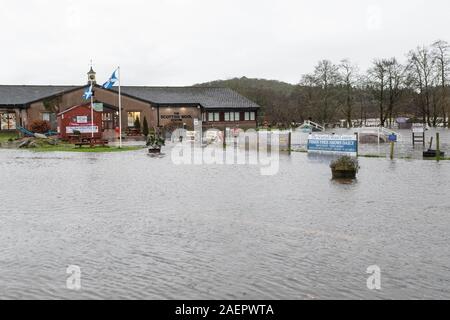 Aberfoyle, Stirlingshire, Scotland, UK. 10th Dec, 2019. UK weather - flooded car park outside The Scottish Wool Centre in Aberfoyle after the River Forth bursts its banks Credit: Kay Roxby/Alamy Live News Stock Photo
