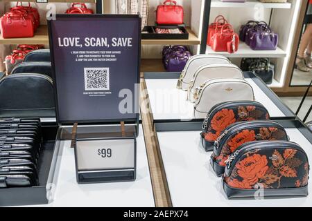 Coach handbags on display at the Coach boutique within Macy's in New York  on Tuesday, August 4, 2015. A tractor trailer containing $500,000 worth of  Coach handbags was stolen from the SalSon