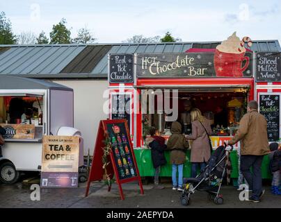 People queuing for hot chocolate on a crisp December day. Stock Photo