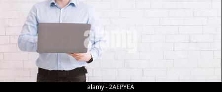 Employee using modern laptop at work, empty space Stock Photo