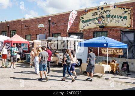 Orlando Winter Park Florida,Downtown,historic district,Farmers' Market,weekly Saturday outdoor,vendor,tents,man,woman,shopping,display sale,FL19111012 Stock Photo