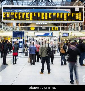 LONDON, UK - 17 NOVEMBER 2011: Liverpool Street Station. Among the passengers on the concourse to the train station in the financial City district. Stock Photo