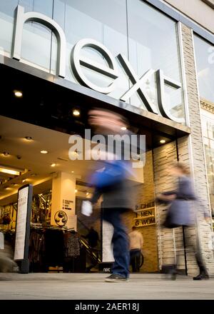 Next Fashion. The shop front to the Next store, a fashion retailer, on London's Oxford Street. Stock Photo
