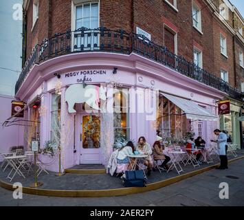 Peggy Porschen in Belgravia London at Christmas, with customers sitting at tables, outside, Stock Photo
