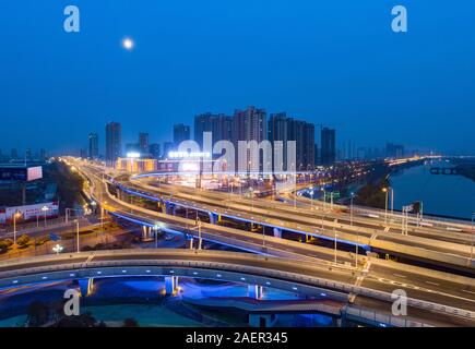 Jiangsu, Jiangsu, China. 10th Dec, 2019. Jiangsu, CHINA-Lights are on at Bating bridge, an elevated section of the inner ring that crosses the li canal, in Huai 'an city, east China's Jiangsu province, Dec. 10, 2019.It is reported that the inner ring elevated highway with an investment of 16.5 billion yuan and a total mileage of 48 kilometers will be officially opened on December 15, which will greatly reduce the time for urban vehicles to leave the city. Credit: SIPA Asia/ZUMA Wire/Alamy Live News Stock Photo