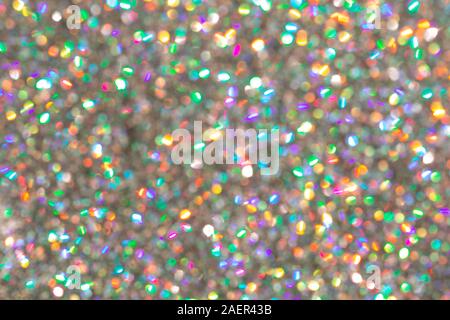 Blurred background with holographic sparkles and lights. Stock Photo