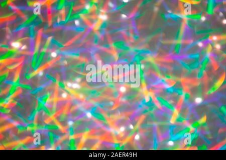 Blurred background with holographic sparkles and lights. Stock Photo