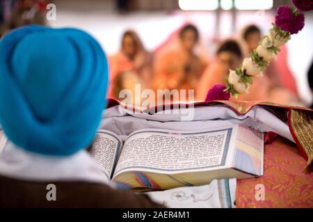 Sikh Religion . Shri Guru Granth Sahib g. Hold Book of Sikhism. Stock Photo