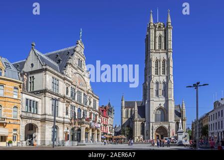 Saint-Bavo's square showing the Royal Dutch Theatre and the St-Bavo's cathedral / Sint-Baafskathedraal in the city Ghent, East Flanders, Belgium Stock Photo