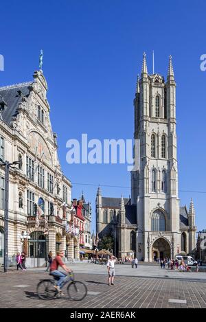 Saint-Bavo's square showing the Royal Dutch Theatre and the St-Bavo's cathedral / Sint-Baafskathedraal in the city Ghent, East Flanders, Belgium Stock Photo