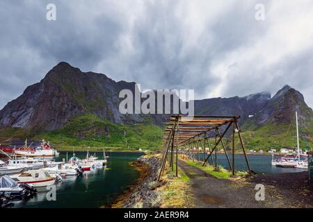 Cod dryer at Reine, fishing village is located on the island of Moskenesoya in the Lofoten archipelago, above the Arctic Circle, Norway. Stock Photo