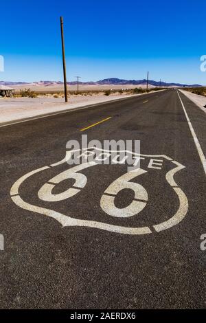 Route 66 sign on the highway at the ghost town of Ludlow along Route 66 in California, USA Stock Photo