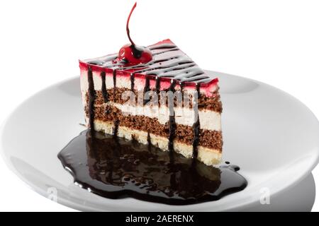 Tasty cake with chocolate topping isolated on white background Stock Photo