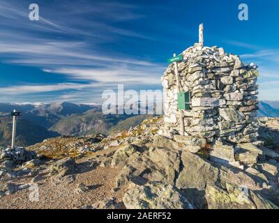 Top of mount Molden, stone cairn,  view towards north,  glacier Jostedalsbre in the background,Lustrafjord, Sogn og Fjordane, Norway, Europe Stock Photo