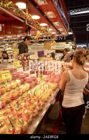 Inside the famous Mercado de La Boqueria in Barcelona, variety available to all visitors who enjoy fresh foods and healthy drinks. Stock Photo