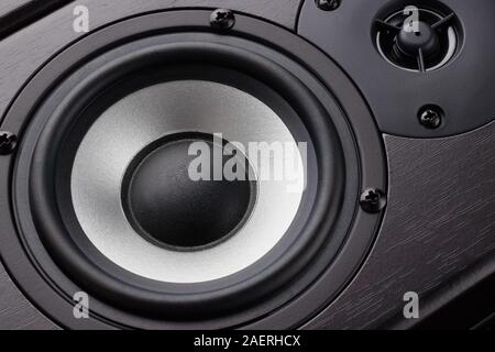 Wooden multimedia system in black close-up. Loudspeakers. Audio speakers. Stock Photo