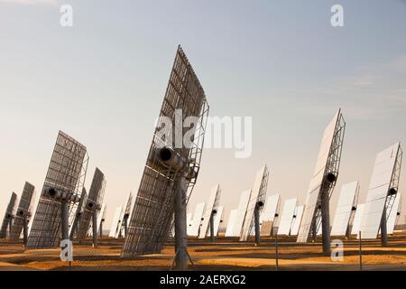 Heliostats, large reflective mirrors directing sunlight to the PS20 solar thermal tower, the only such working solar tower currently in the world. Its Stock Photo
