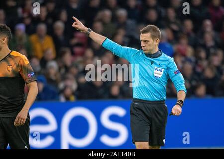 Amsterdam, Netherlands. 10th Dec, 2019. Referee Clement Turpin (FRA) during the UEFA Champions League game between Ajax and Valencia. The game took place at the Johan Cruyff Arena in Amsterdam, Holland. Credit: Richard Callis/FotoArena/Alamy Live News Stock Photo