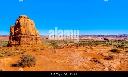 The tall and fragile sandstone Rock Pinnacles in the desert landscape of Arches National Park near Moab in Utah, United States Stock Photo