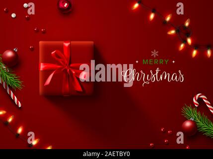 Red Christmas background with Christmas decor including lights, baubles, gift box, fir tree cuttings, glitter, berries and candy vane. Vector Illustra Stock Vector