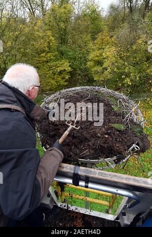 Karlsruhe, Germany. 18th Nov, 2019. Stefan Eisenbarth cleans a stork's nest on a voluntary basis. Plastic waste in particular, which storks bring into the nest as supposed food or nesting material, is harmful for the animals. (to dpa: 'Cleaning in the stork's nest - danger by plastic garbage') Credit: Uli Deck/dpa/Alamy Live News Stock Photo